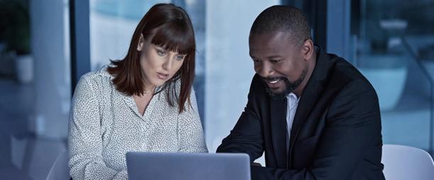 Business professionals discussing correspondent clearing services