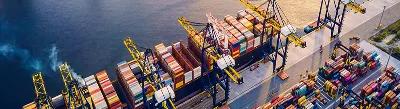 Aerial view of water and shipping containers