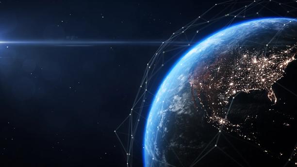 View of Earth at night showing city lights and global connectivity