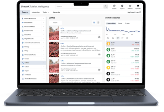 StoneX Market Intelligence platform showing coffee commodity forecasts and live market data on a laptop screen