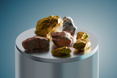 Unrefined metals on a circular platform against a teal background
