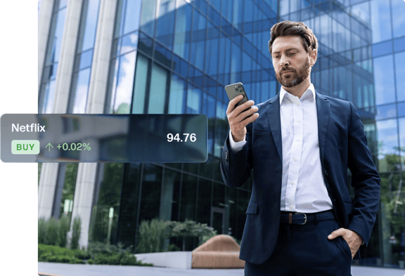 Trader outside modern glass office building with Netflix price overlay