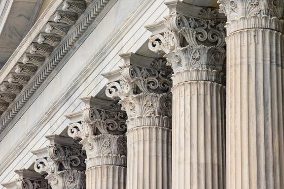  Ornate stone columns on classical building