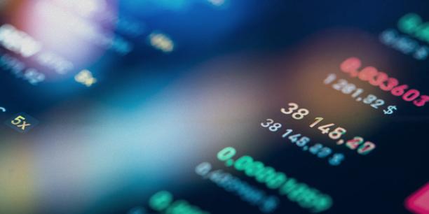 Close-up of a digital financial trading screen displaying market data, price quotes, and performance metrics.
