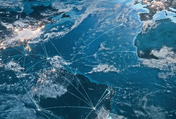 Global network connections illustrated across continents on a digital Earth map