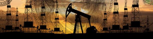 Oil pumpjacks operating at dusk, symbolizing petroleum production and global energy supply