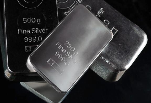Stacked silver bullion bars with LBMA Good Delivery markings