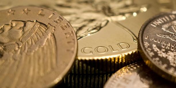 Close-up of gold bullion coins symbolising gold trading and investment opportunities