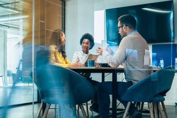 Team of professionals discussing financial strategy