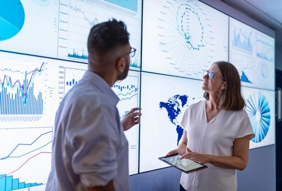 Team collaborating on strategy in a corporate office	