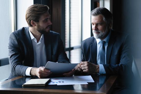 Team of professionals discussing financial strategy
