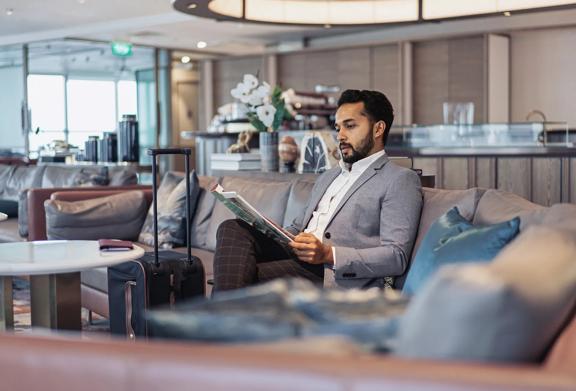 Financial professional reviewing investment tools on a tablet, representing informed decision-making