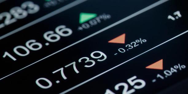 Digital financial market display showing live price values, percentage changes, and directional indicators for market performance. Trading data interface illustrating real time market movements, price fluctuations, and financial market activity.