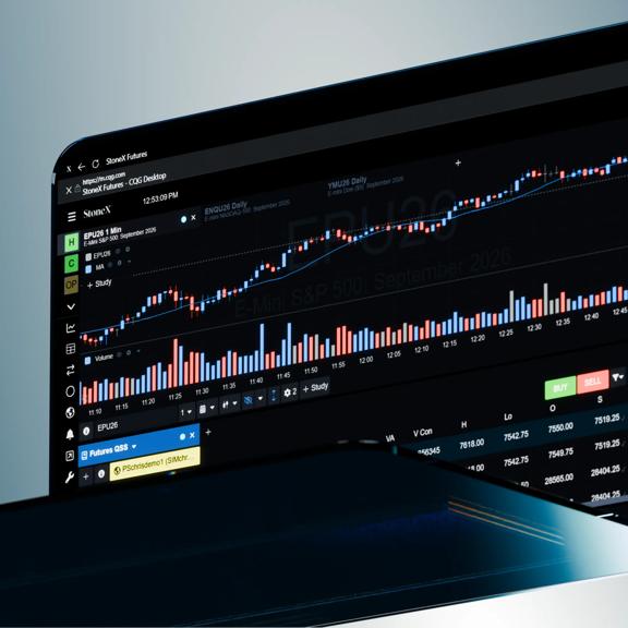 Tablet displaying the StoneX Futures platform with a candlestick chart and order entry panel