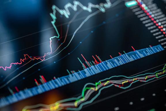 Dark digital screen displaying global financial market data