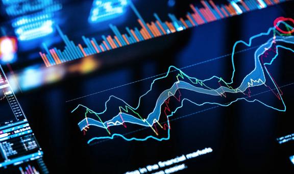Digital screen displaying complex financial graphs, trading data, and market analytics

