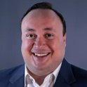 Headshot of Greg Kallinikos - Chief Executive Officer of Asia Pacific
