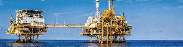 Offshore oil drilling platform in ocean waters, symbolizing deep-sea energy exploration