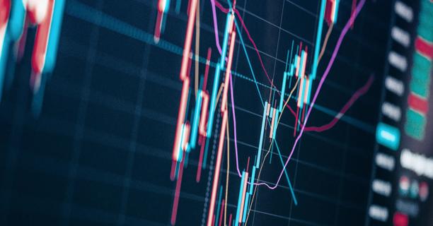 Digital financial chart with candlesticks and trend lines showing market analysis data