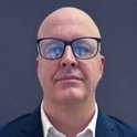 Headshot of Charles Lyon - Group President