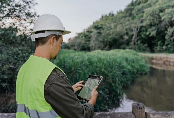 Environmental monitoring at silver recovery site with digital tools supporting sustainability and emissions control.