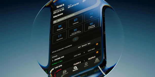 Smartphone displaying a financial trading application with market categories, asset classes, and live pricing data. Mobile trading platform designed for accessing financial markets, monitoring price movements, and managing trading opportunities on the go.