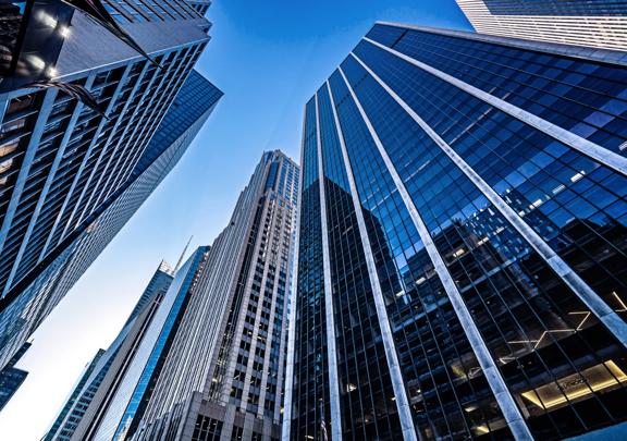 Modern Financial District Skyscrapers Against Blue Sky