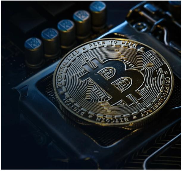 Close-up of a Bitcoin coin representing cryptocurrency and digital assets.
