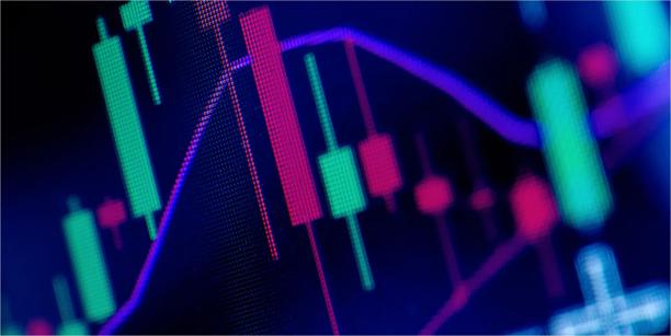 Close‑up of a colorful candlestick chart with glowing lines representing market data on a dark background.