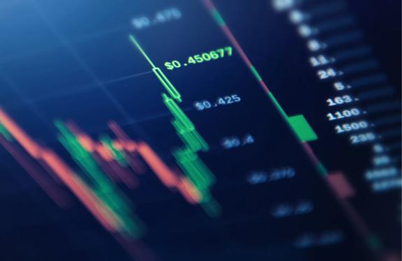 Close-up of a financial market chart showing price fluctuations and candlestick patterns, indicating market trends