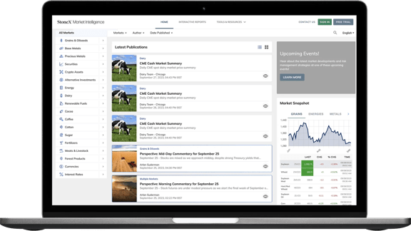 O site da StoneX Market Intelligence mostra publicações de mercado e um instantâneo do mercado em tempo real na tela de um laptop