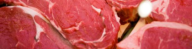 Raw cuts of red meat displayed close-up, symbolizing livestock farming and global meat markets