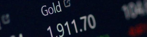 Digital screen showing gold spot price at 1911.70, symbolizing live precious metal pricing and market monitoring