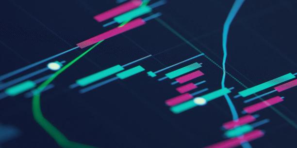 Close up view of a financial trading chart displaying green and pink candlestick patterns, trend lines, and market indicators on a digital trading platform. Technical analysis graphic illustrating price movements, trading activity, and financial market trends.