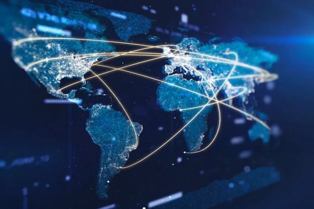 Digital world map showing illuminated connections between continents, symbolizing global trade and connectivity.