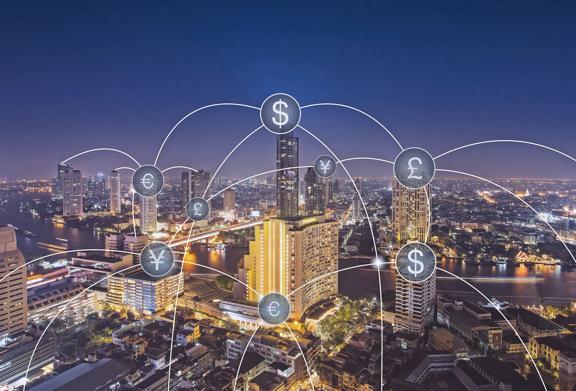 Night cityscape with currency symbols, illustrating global payment networks and local currency acceptance.