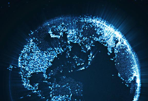 Digital rendering of Earth with glowing blue data points representing global connectivity