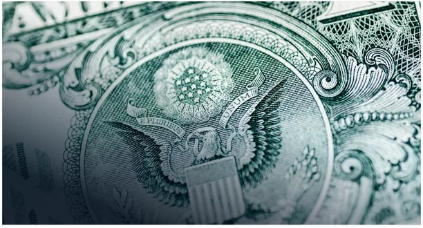 Close-up of a US dollar banknote representing currency markets.