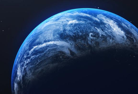 Detailed view of Earth from space, showcasing the blue oceans, clouds, and the curvature of the planet.
